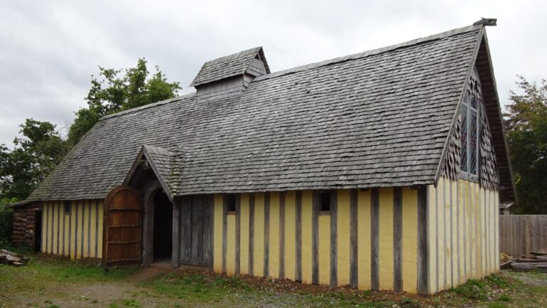 Reconstructed Anglo-Saxon longhall with timber frame and wattle walls